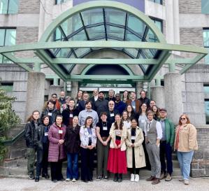 A group photograph of the RESAC Conference participants outside the entrance to the Sobey building.