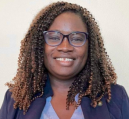 A woman posing professionally for a photo