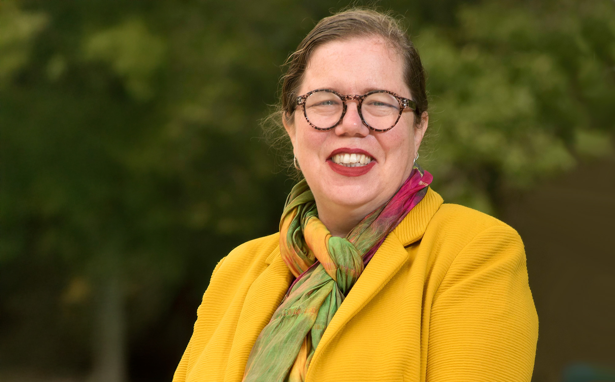 Dr. Shannon Dea standing outside.