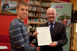 Alexander (Sandy) Berry being presented with the ICUF Certificate.